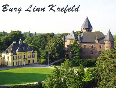 Burg Linn bij Krefeld met rozen- en lavendelperken en een themaspeeltuin in kasteellandschap